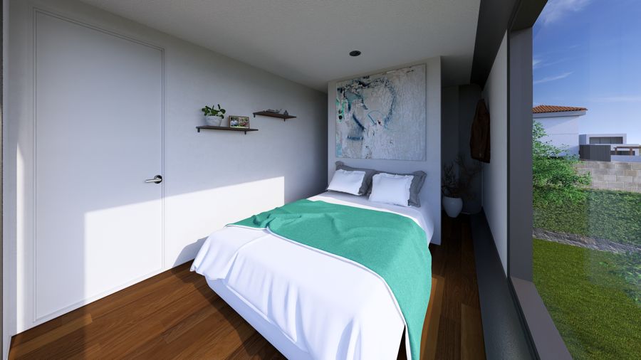 Salón interior con sofá modular y arte en pared.